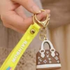 Cute Mini Handbag Keychain with Rainbow Strap Stylish Bag Charm Key Chain